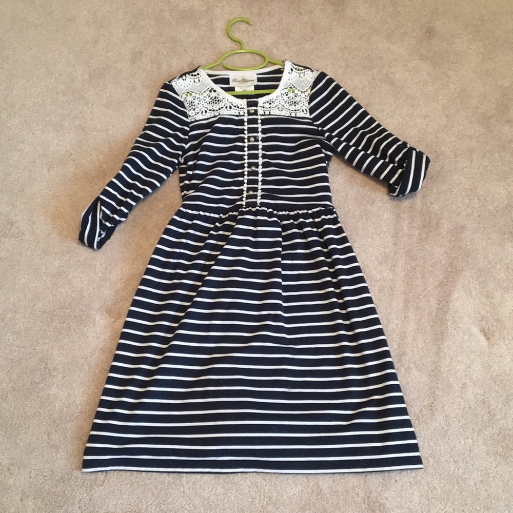 girl’s navy and white striped dress